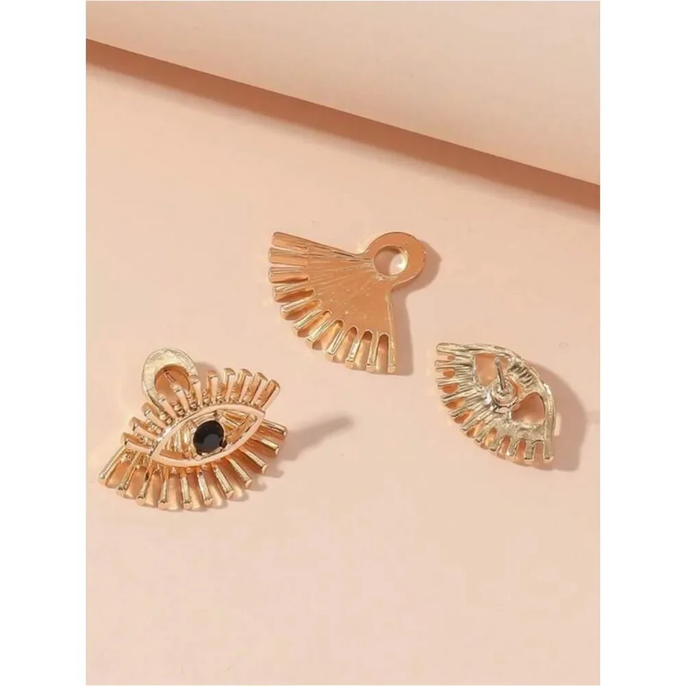 Gold Eye Stud Earrings with Black Stone R 443